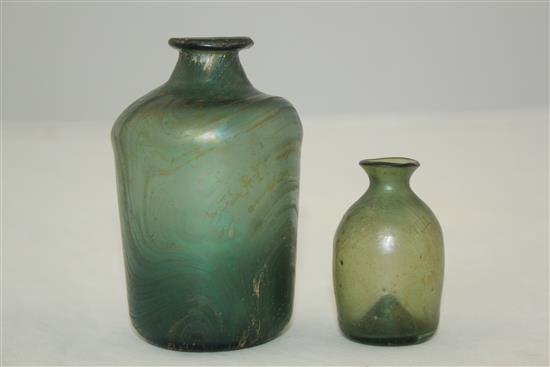 Two Roman glass bottles, c.2nd-4th century AD, 5.5 - 9.5cm